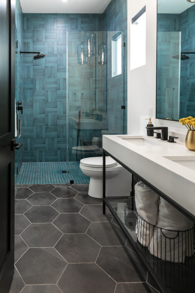 This is an example of a contemporary grey and teal bathroom in Austin.