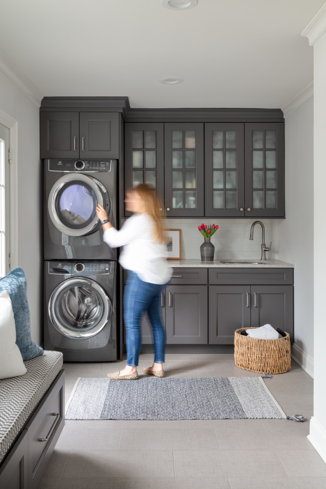 Photo of a transitional laundry room in New York.