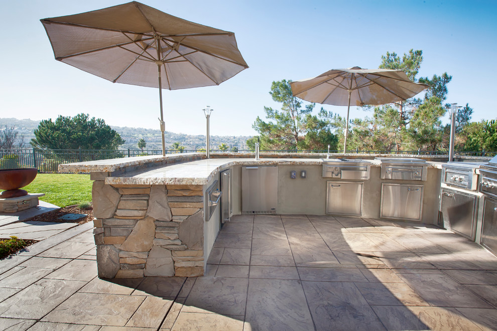 Inspiration for an expansive traditional backyard patio in San Francisco with an outdoor kitchen, concrete pavers and no cover.