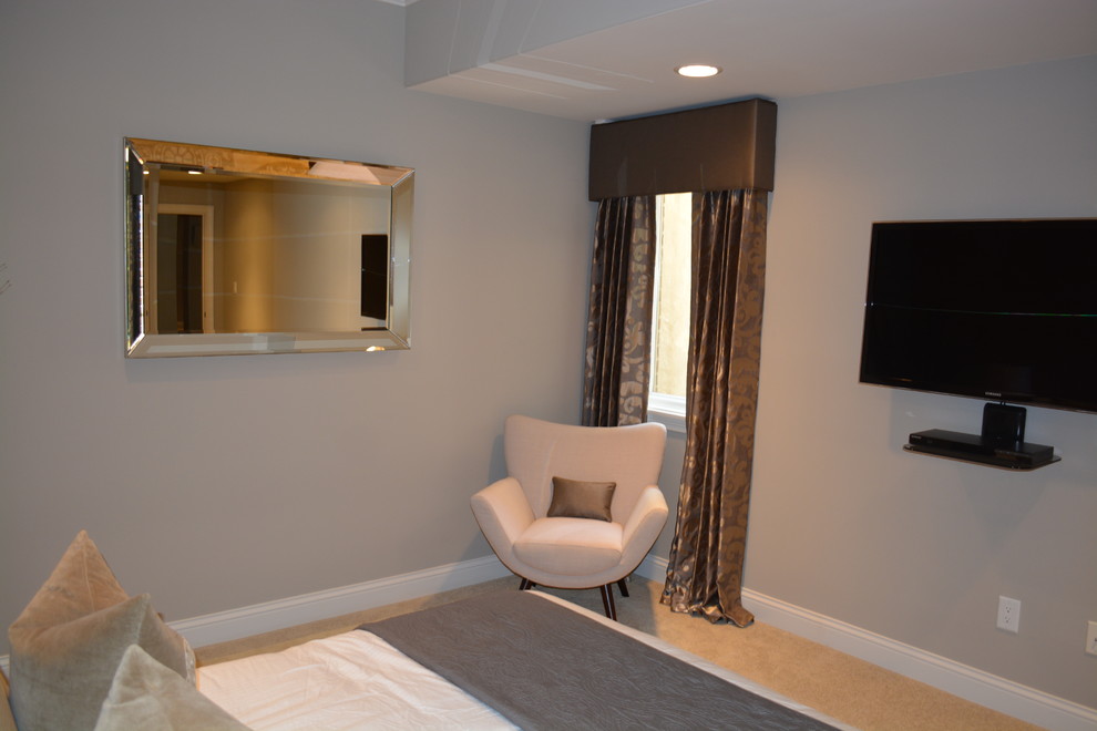 Mid-sized transitional guest bedroom in Indianapolis with beige walls and carpet.