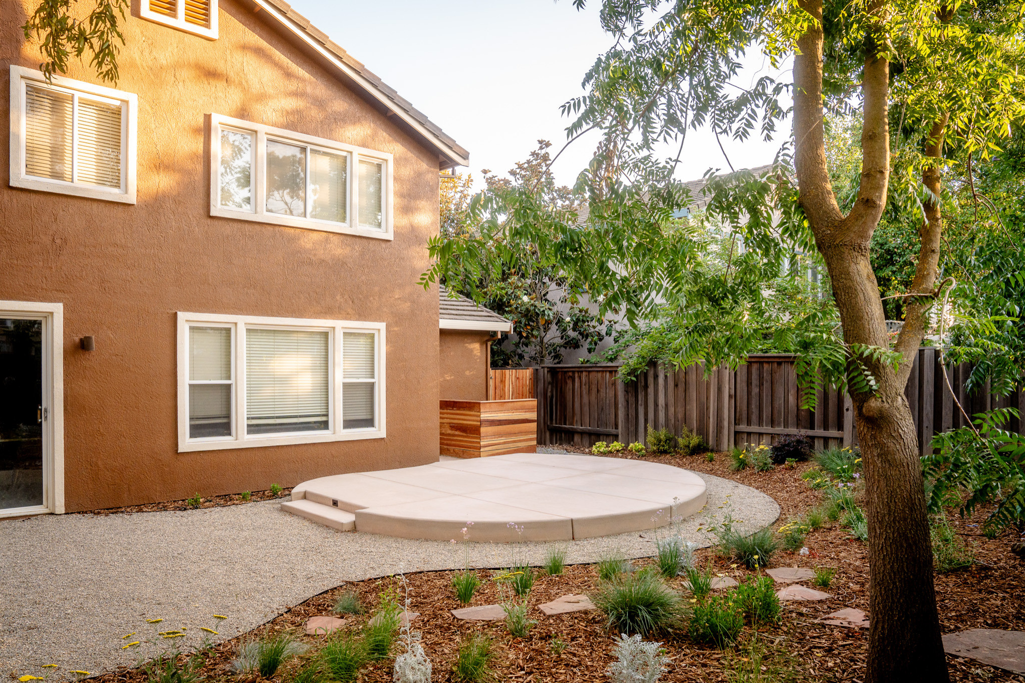 Curved Patio & Flowing Garden Paths in a Restorative Backyard