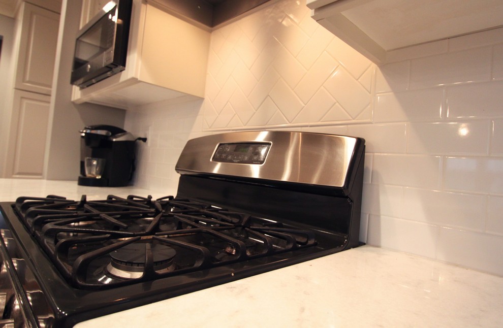 Example of a transitional kitchen design in Omaha