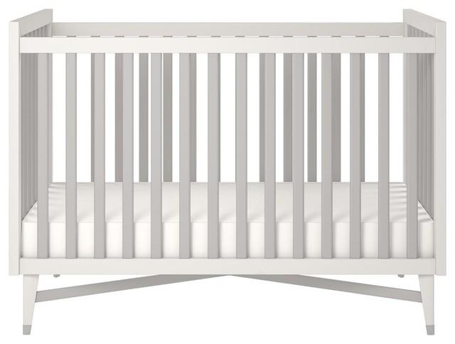 white and wood crib