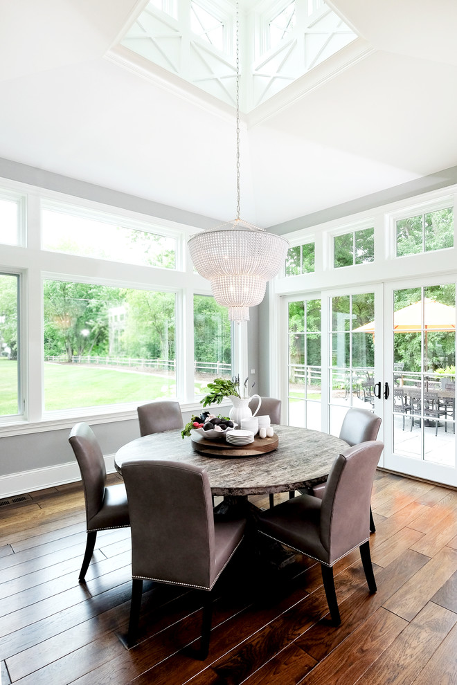 Inspiration for a mid-sized transitional dark wood floor kitchen/dining room combo remodel in Chicago with gray walls and no fireplace