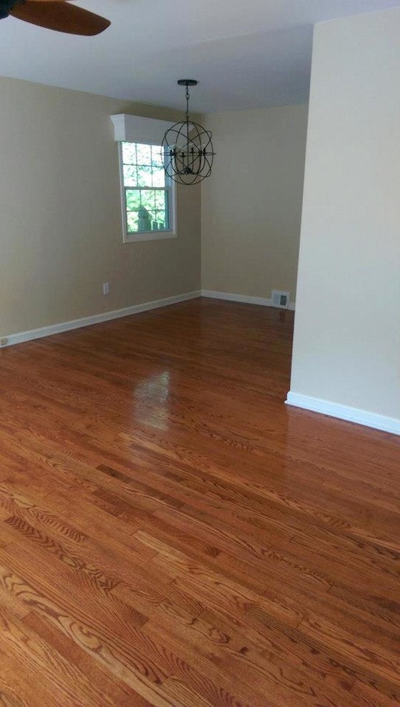 Great room - mid-sized transitional medium tone wood floor great room idea in Baltimore with beige walls