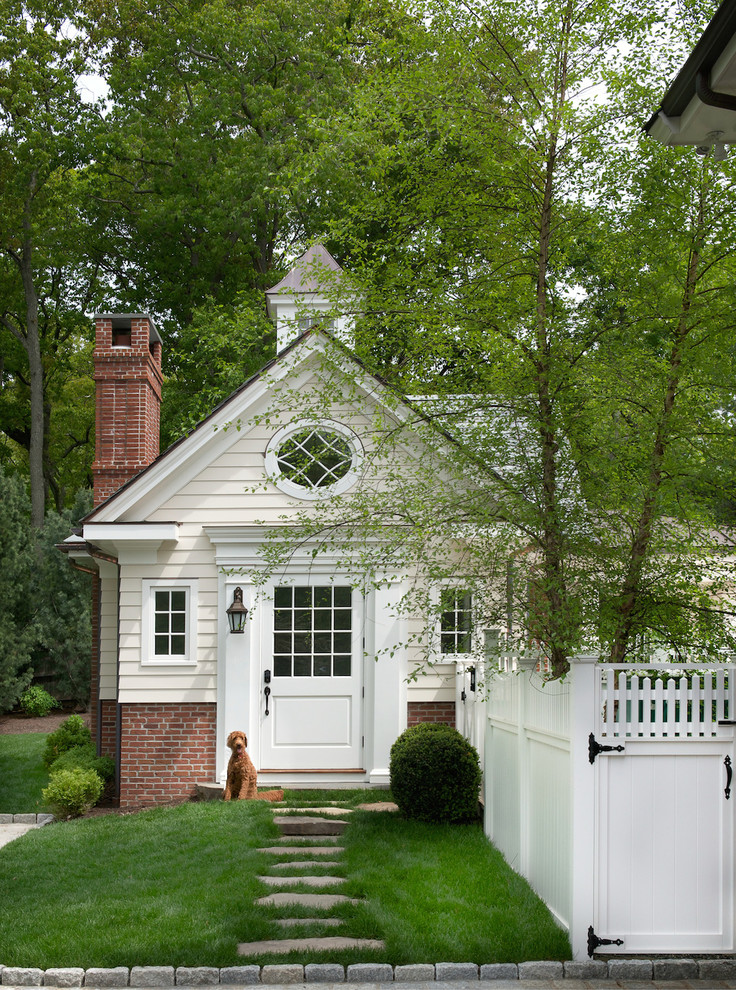 This is an example of a traditional front door in New York with a single front door and a white front door.