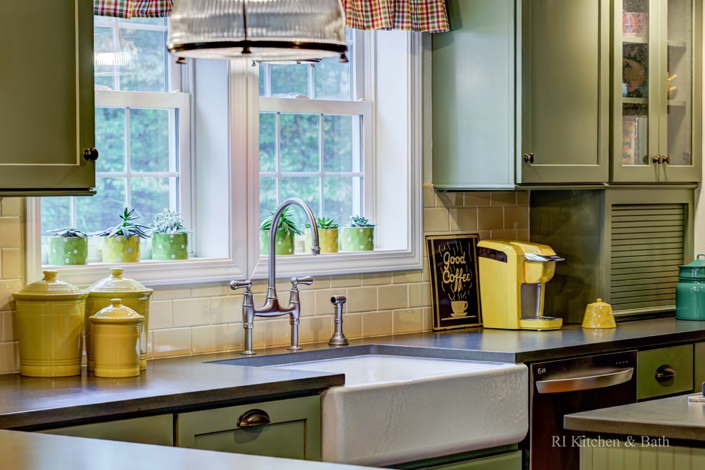 Inspiration for a large rural u-shaped kitchen/diner in Providence with a belfast sink, shaker cabinets, green cabinets, granite worktops, yellow splashback, ceramic splashback, stainless steel appliances, medium hardwood flooring and an island.