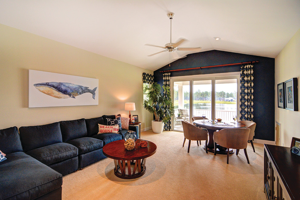 Inspiration for a large beach style open concept family room in Tampa with a game room, beige walls and carpet.