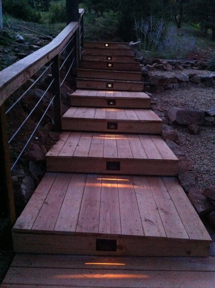 Inspiration for a small rustic backyard deck container garden remodel in Denver with no cover