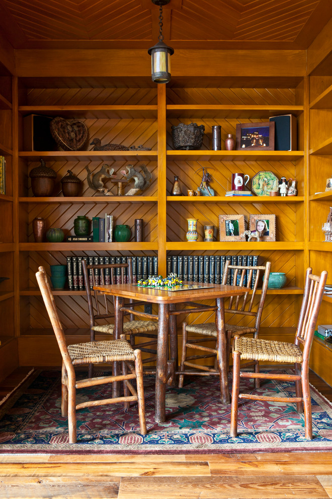 This is an example of an arts and crafts dining room in Other.
