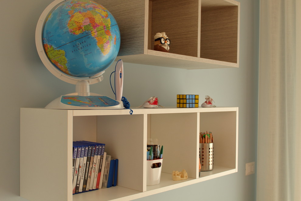 Inspiration for a large contemporary kids' room for boys in Bari with blue walls and porcelain floors.