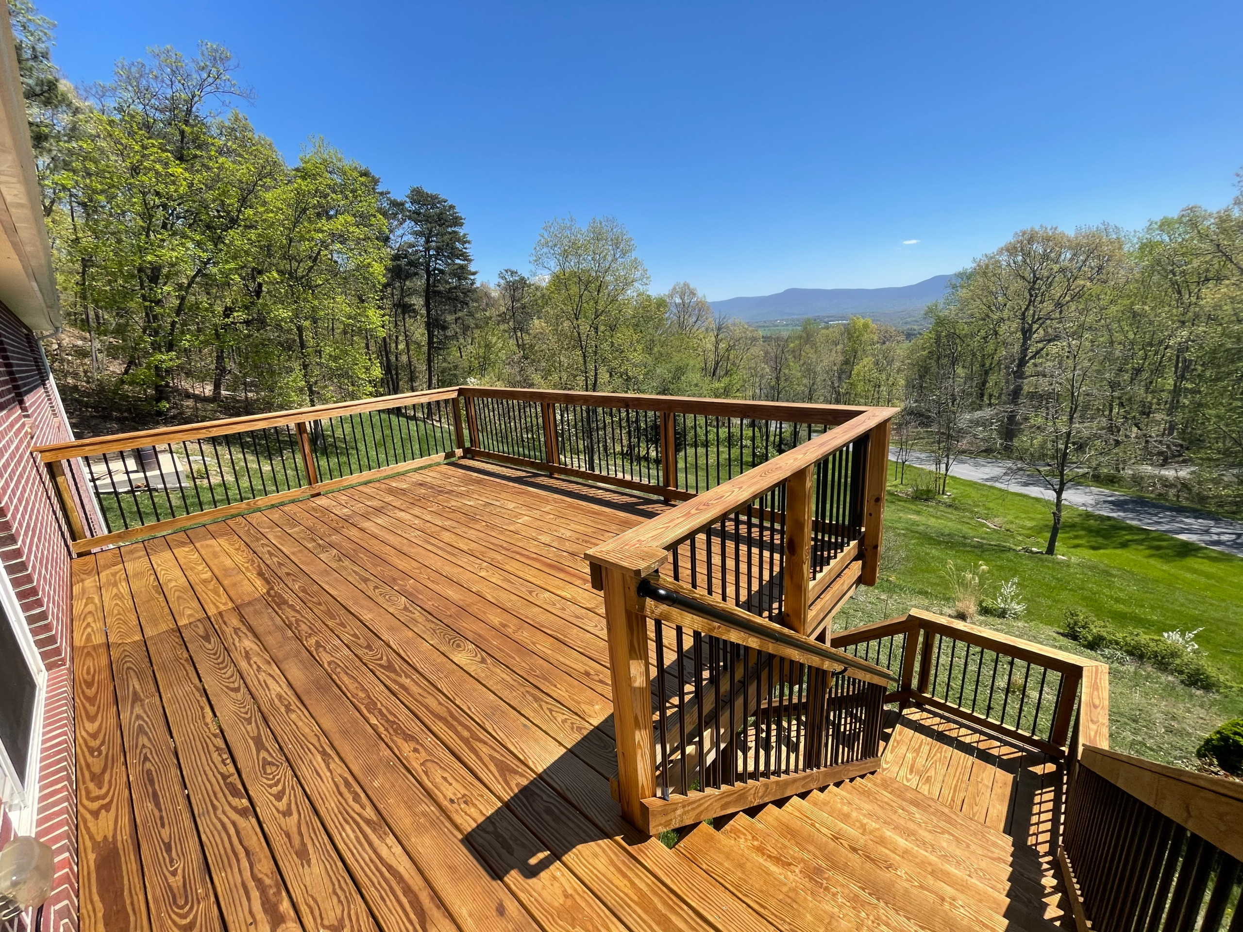 Deck stain and gutters power wash