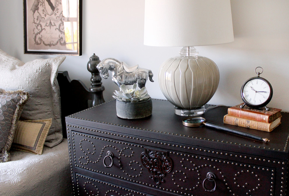 Traditional Rumson Home - A leather chest is embellished with satin nickel nail-heads for a masculine feel.