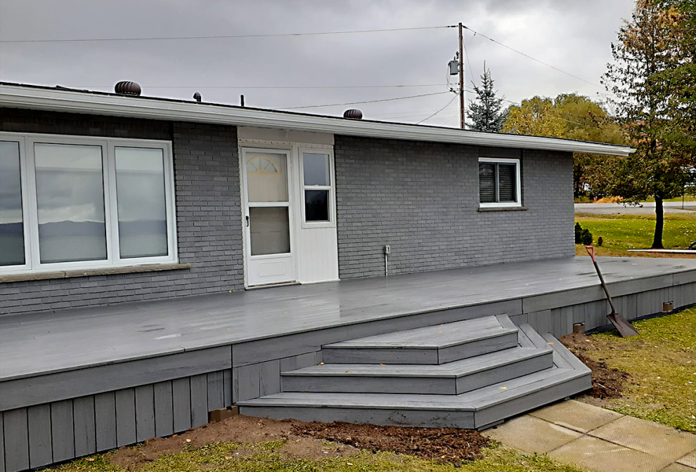 Deck skirting - mid-sized transitional ground level deck skirting idea