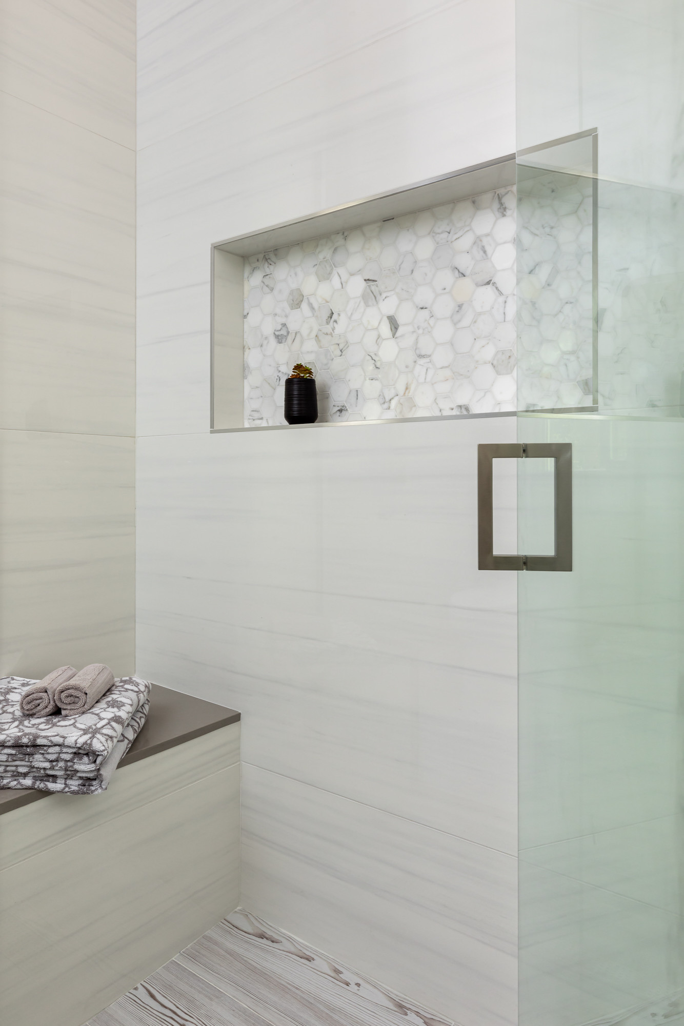 Ensuite Guest Shower with Bench with Extra Large Porcelain Wall Tile for Fewer G