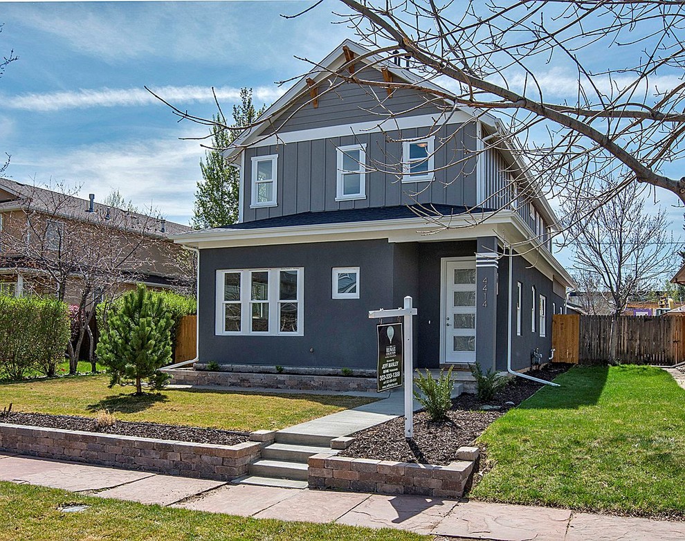 Example of a transitional home design design in Denver