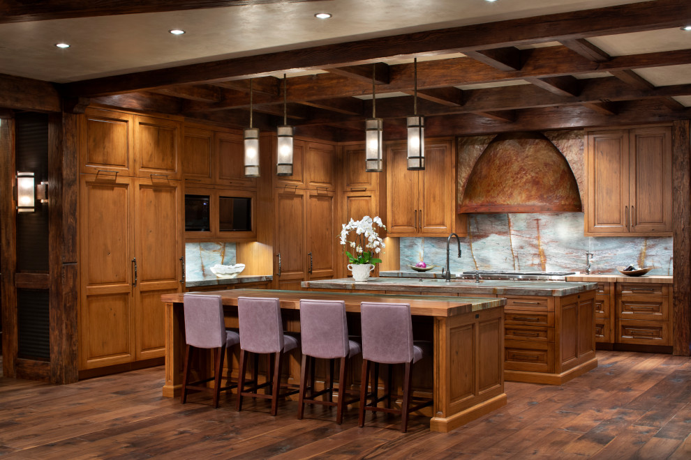 Photo of a traditional kitchen in Denver with panelled appliances, multiple islands, an undermount sink, recessed-panel cabinets, medium wood cabinets, multi-coloured splashback, medium hardwood floors, brown floor, multi-coloured benchtop and coffered.
