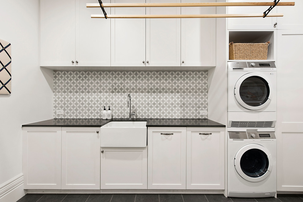 Photo of a transitional laundry room in Melbourne.