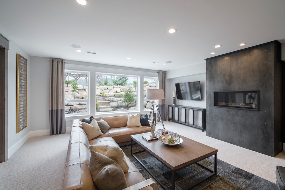 Transitional open concept family room in Salt Lake City with grey walls, carpet, a standard fireplace, a metal fireplace surround and a wall-mounted tv.