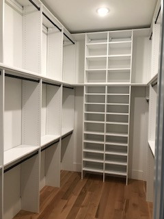 Triple-Hang Primary Closet with Floor-to-Ceiling Open Shelves