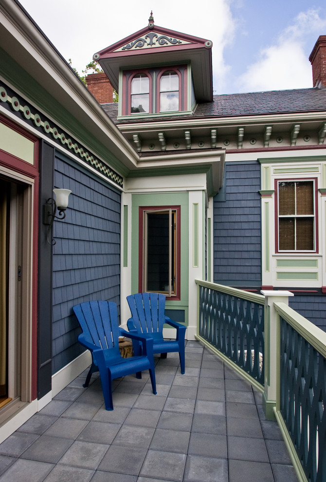This is an example of a traditional balcony in Boston with no cover.