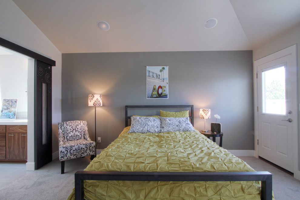 Design ideas for a mid-sized modern master bedroom in Portland with grey walls and carpet.