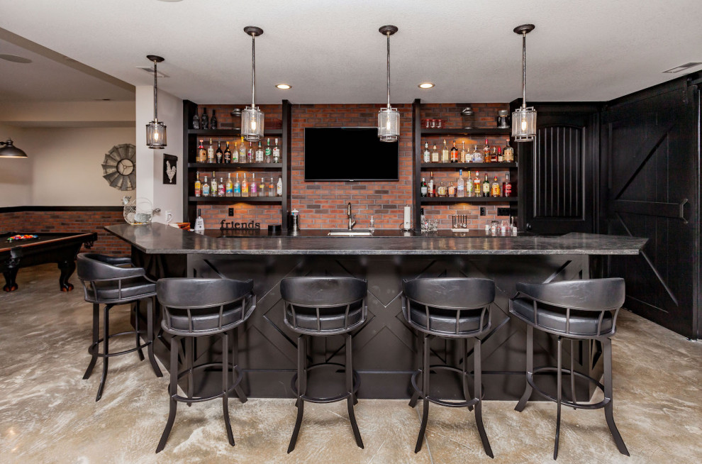 Photo of a traditional seated home bar in Cedar Rapids with an undermount sink, open cabinets, brown cabinets, brick splashback and grey benchtop.