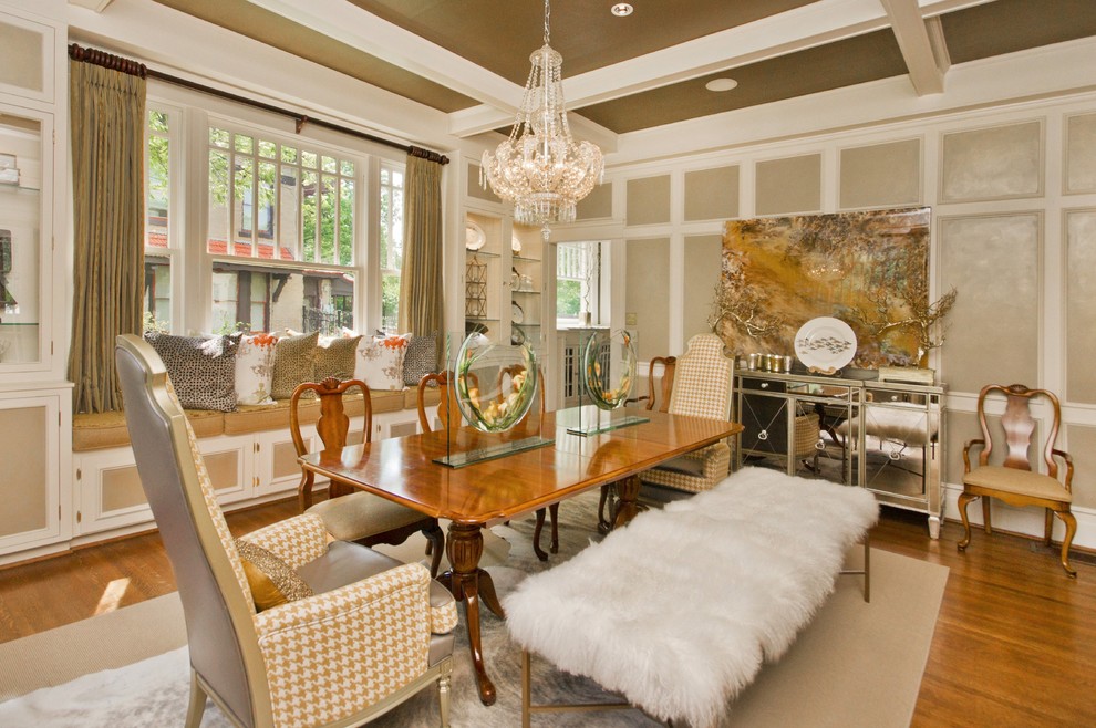 Photo of an eclectic dining room in Dallas with medium hardwood floors.