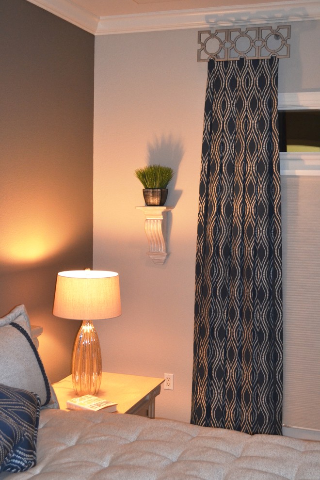 Example of a mid-sized transitional master carpeted home design design with multicolored walls