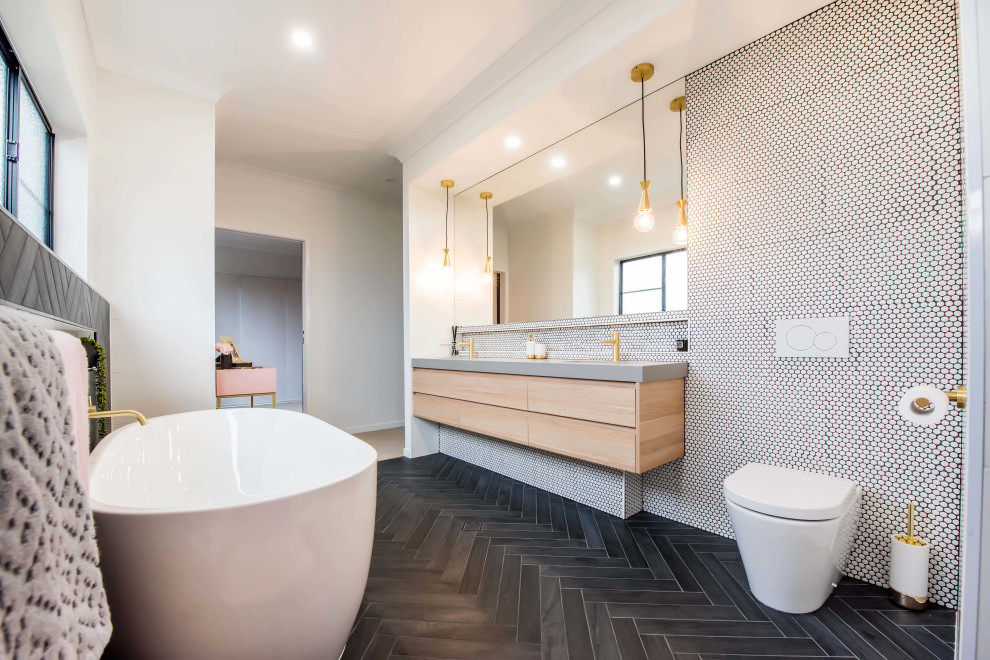 This is an example of a modern bathroom in Sydney with engineered quartz benchtops.