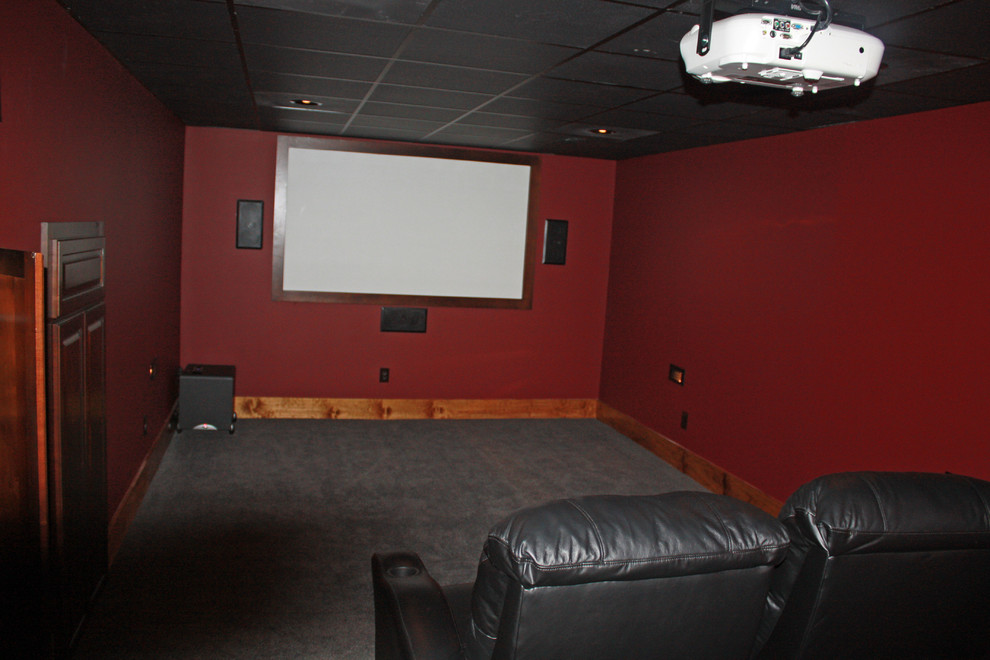 This is an example of a country home theatre in Charlotte.