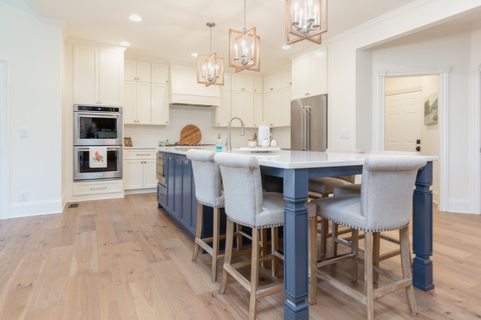 Example of a transitional home design design in Atlanta