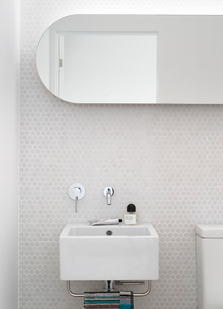 Design ideas for a contemporary bathroom in Sydney with a wall-mount sink, white tile and mosaic tile.