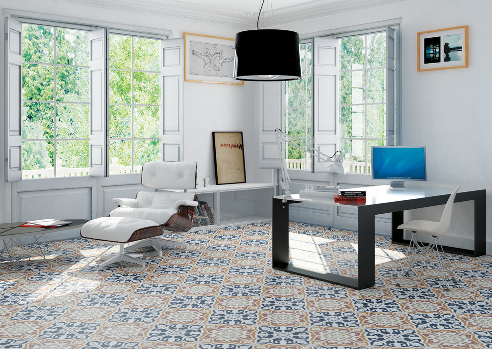 This is an example of a large mediterranean home office in New York with white walls, porcelain floors, no fireplace, a freestanding desk and multi-coloured floor.