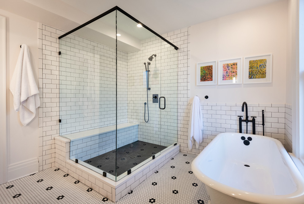 Mid-sized traditional master bathroom in Richmond with flat-panel cabinets, light wood cabinets, a claw-foot tub, a corner shower, white tile, subway tile, white walls, ceramic floors, engineered quartz benchtops, white floor, a hinged shower door, white benchtops, a shower seat, a double vanity and a floating vanity.