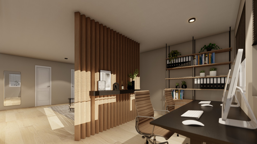 Esempio di un ufficio minimal di medie dimensioni con pareti beige, pavimento in laminato, scrivania autoportante e pavimento beige