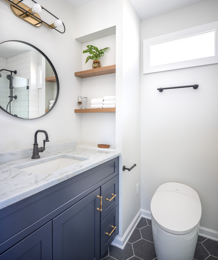 Small eclectic kids bathroom in Raleigh with shaker cabinets, grey cabinets, a bidet, white tile, porcelain tile, white walls, porcelain floors, an undermount sink, quartzite benchtops, blue floor, a sliding shower screen, white benchtops, a single vanity and a built-in vanity.