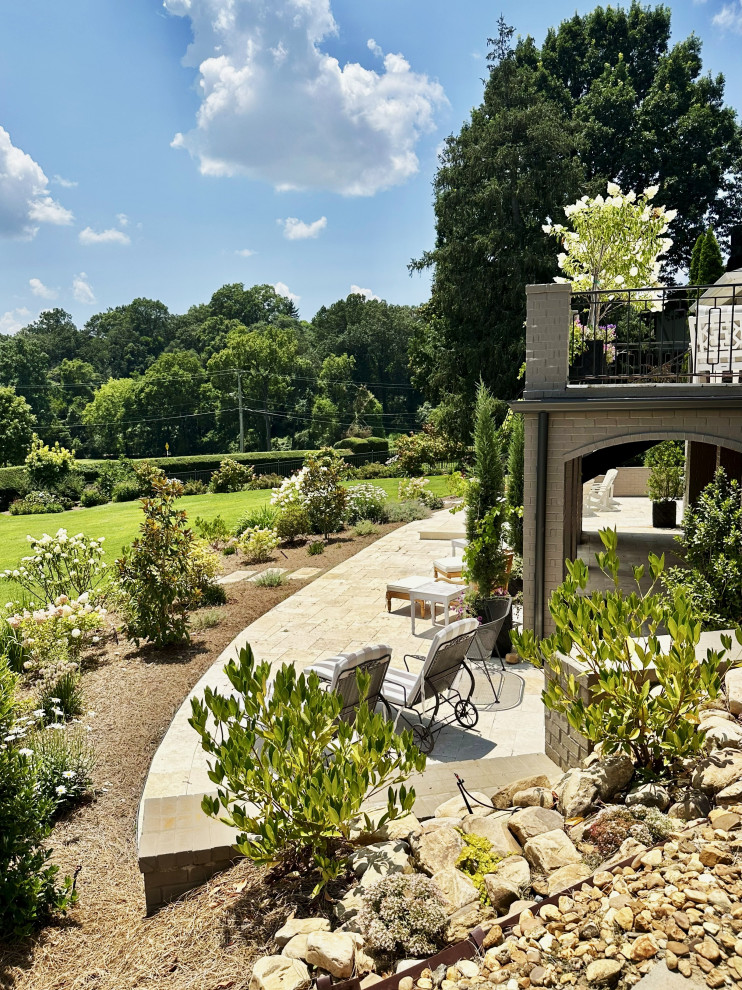 Design ideas for a huge contemporary full sun backyard landscaping in Other for summer.