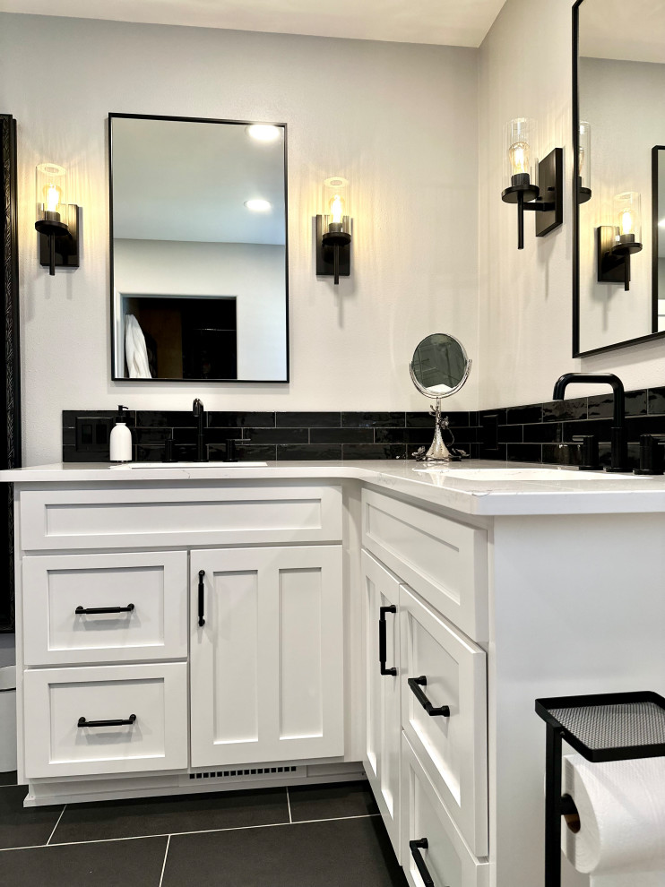 Inspiration for a mid-sized transitional master black tile and subway tile ceramic tile, black floor and double-sink corner shower remodel with recessed-panel cabinets, white cabinets, a two-piece toilet, white walls, an undermount sink, quartz countertops, a hinged shower door, white countertops and a built-in vanity