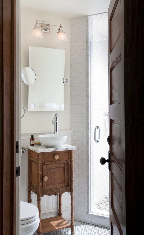 Small mountain style 3/4 white tile and subway tile mosaic tile floor alcove shower photo in Boston with medium tone wood cabinets, white walls, a vessel sink, quartz countertops and recessed-panel cabinets