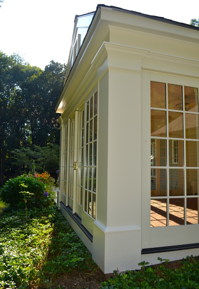 This is an example of a traditional sunroom in New York.