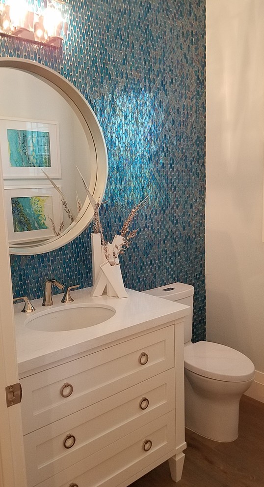 Powder room - tropical powder room idea in Miami