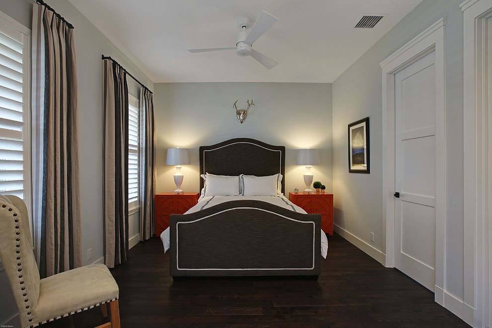 Mid-sized transitional guest bedroom in Miami with grey walls, dark hardwood floors, no fireplace and brown floor.