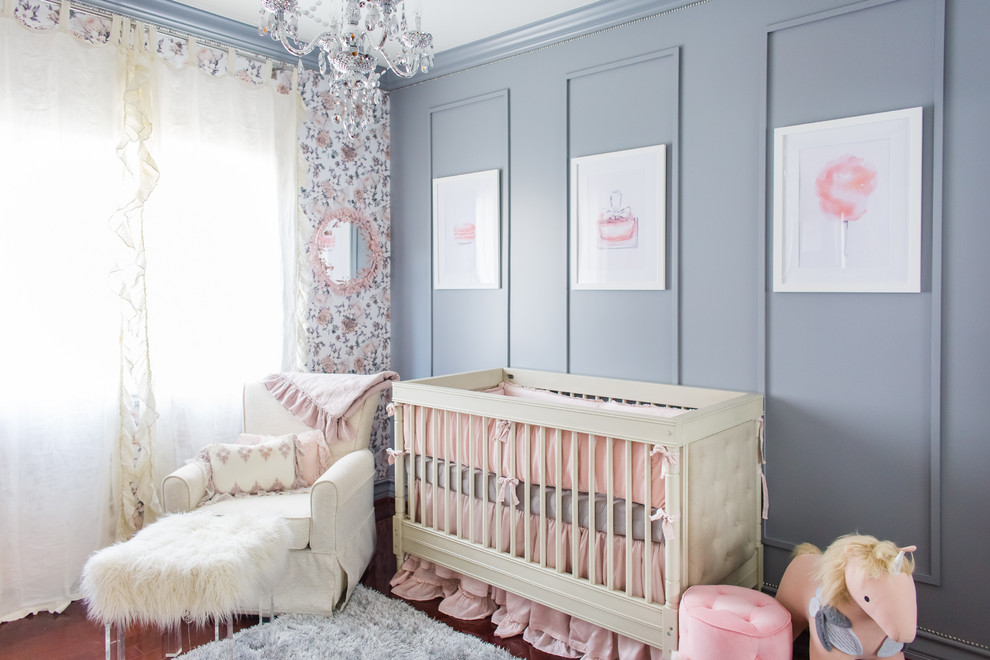 Inspiration for a mid-sized traditional nursery for girls in New York with grey walls and dark hardwood floors.