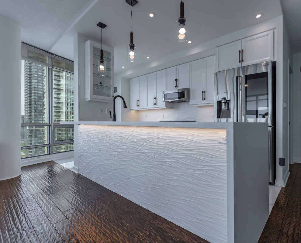 Example of a transitional kitchen design in Toronto