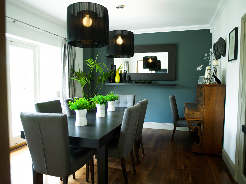 Inspiration for a contemporary separate dining room in Other with grey walls and dark hardwood floors.