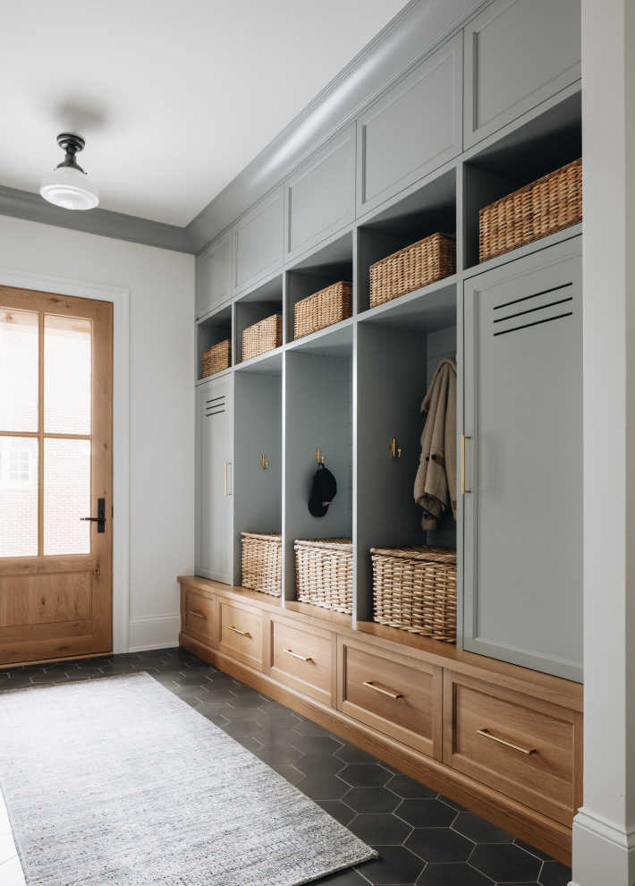 Medium sized classic boot room in Chicago with white walls, light hardwood flooring, a double front door, a medium wood front door, grey floors and panelled walls.