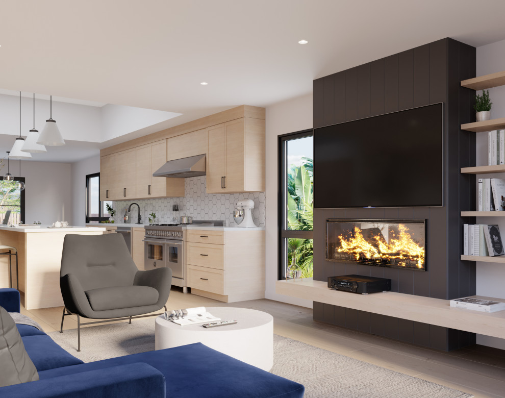 This is an example of a mid-sized midcentury open concept living room in Los Angeles with white walls, light hardwood floors, a standard fireplace, a wall-mounted tv and white floor.