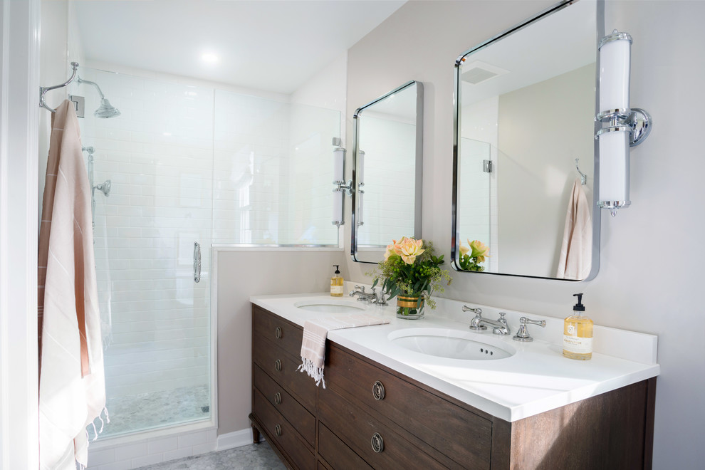 Small traditional master bathroom in Other with furniture-like cabinets, dark wood cabinets, an alcove shower, a one-piece toilet, white tile, porcelain tile, marble floors, a console sink, engineered quartz benchtops and a hinged shower door.