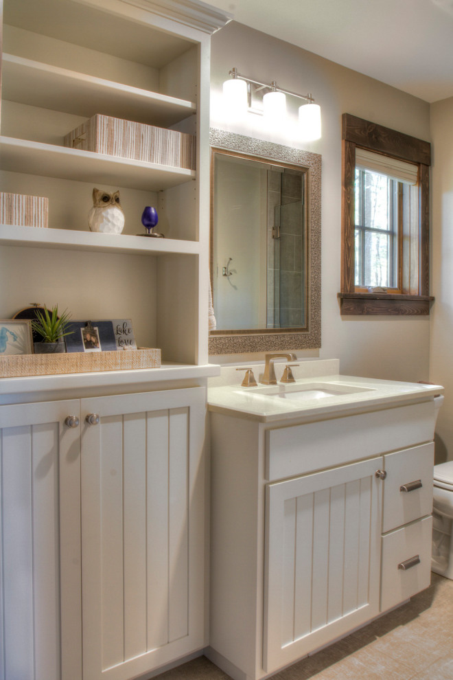 Mid-sized scandinavian bathroom in Minneapolis with beaded inset cabinets, white cabinets, a two-piece toilet, white walls, an undermount sink, engineered quartz benchtops, a single vanity and a built-in vanity.